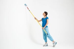 Women painting a wall